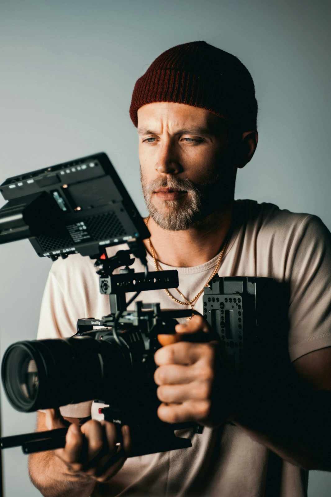 A cinematographer working with a cinema camera